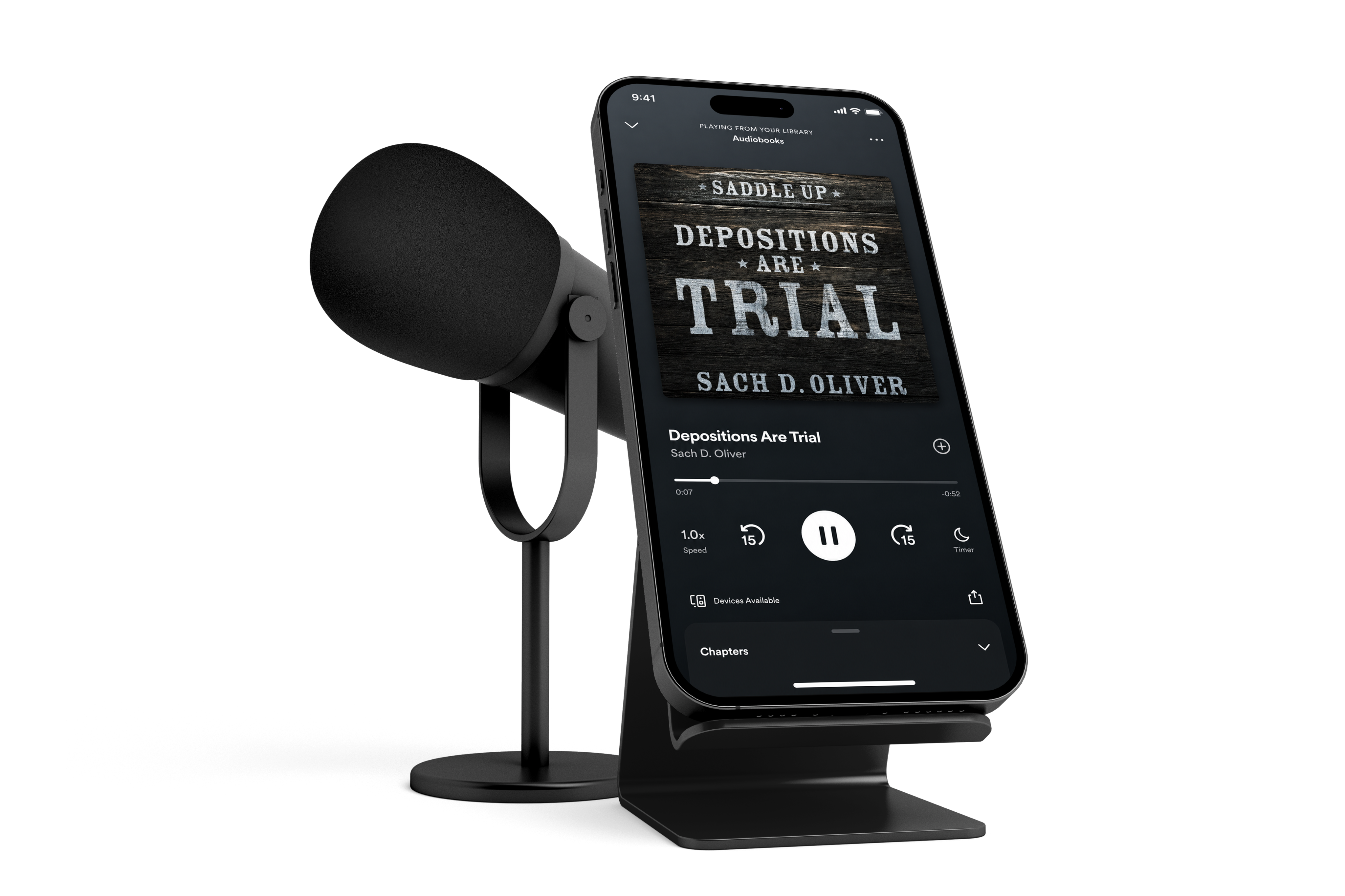 Depositions Are Trial audiobook 
  playing on a phone beside a studio microphone
